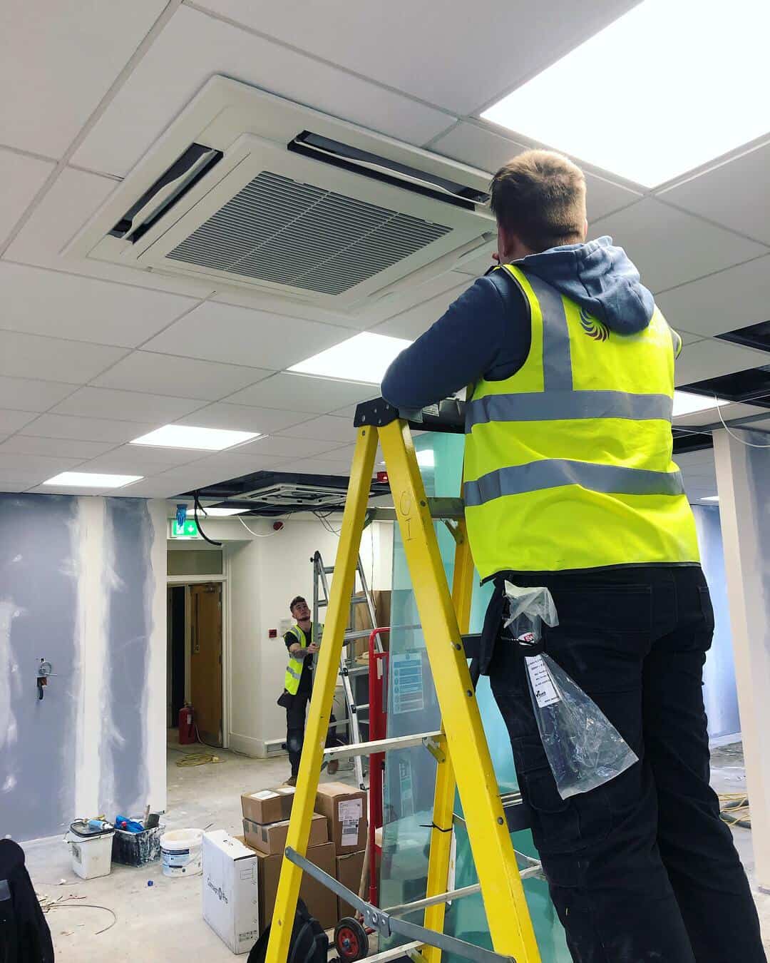 Chill Air engineer installing the finishing touches to office air conditioning